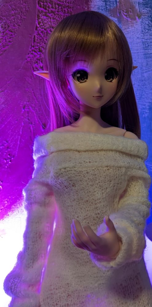 Smartdoll in purple light.