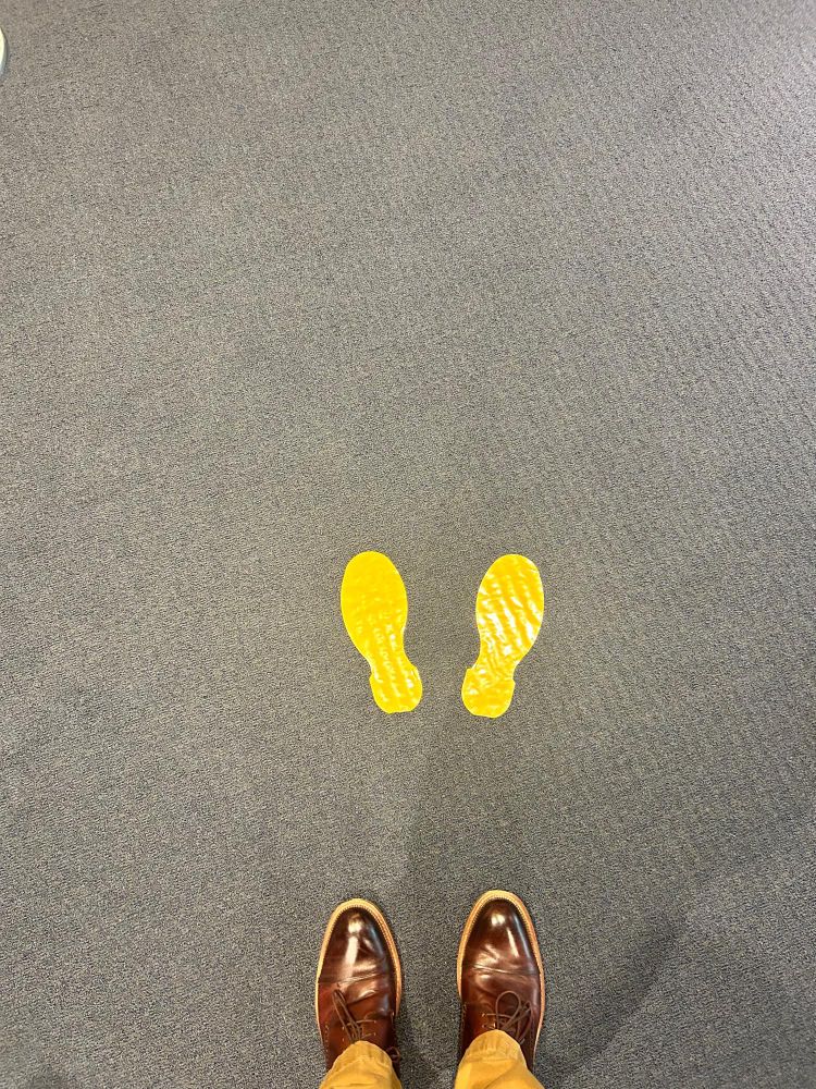 Yellow footprints on the ground 