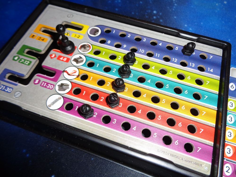 Player board complete with gears and pegs to track resources.