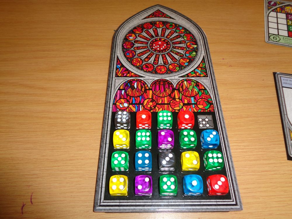 A completed player board for the game Sagrada.