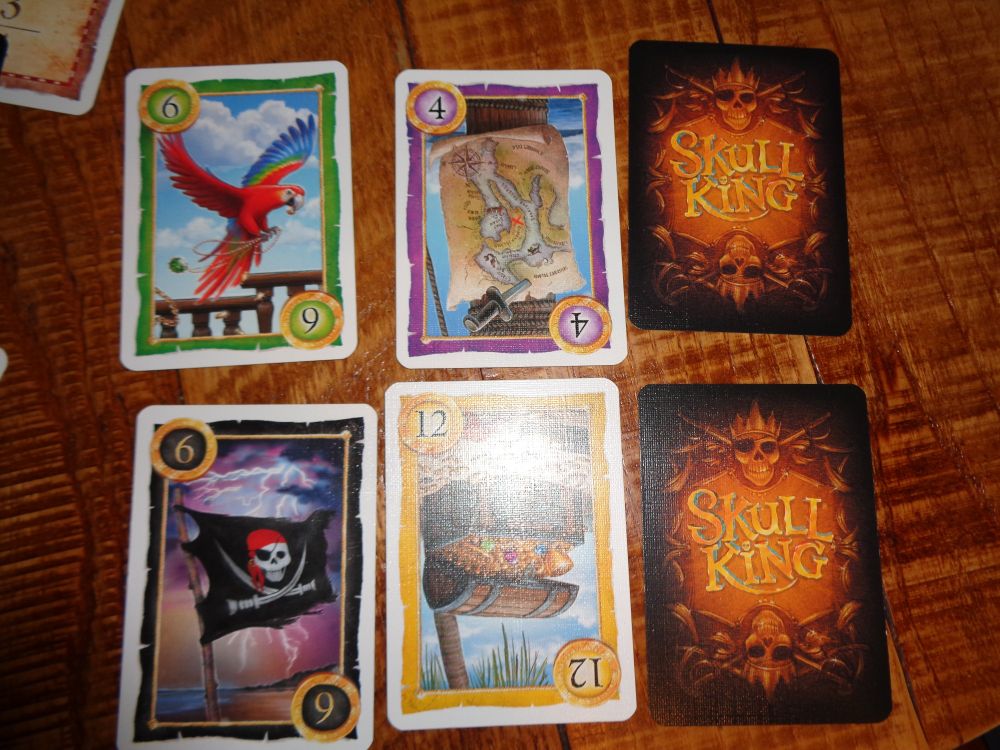 A sample of different cards from all 4 suits in the Skull King game.