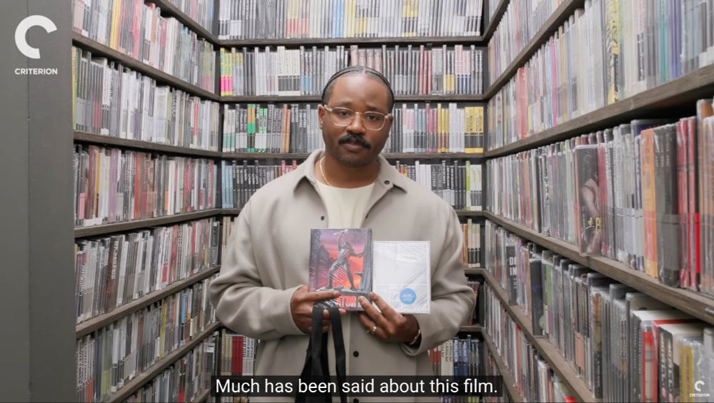 ryan coogler in the criterion closet "holding" a "Predator 2" blu ray