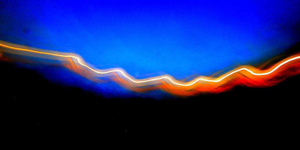 it's basically a narrow beam of pure light energy created by the sun between day and night along a treeline. On canvas 24x48