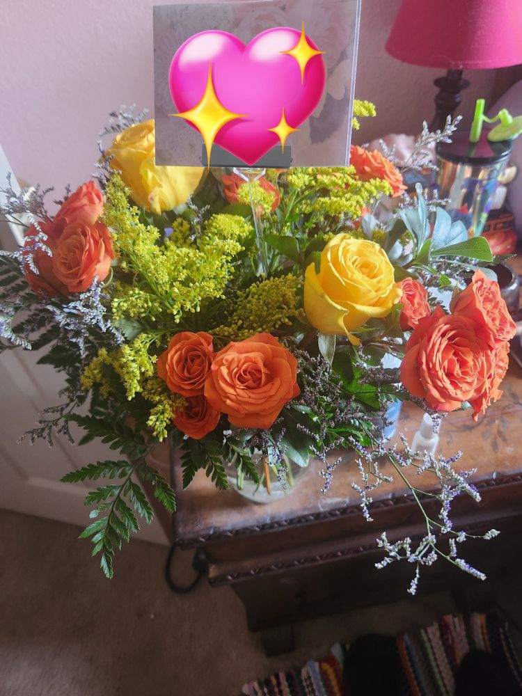 Picture of a bouquet of yellow and orange roses.