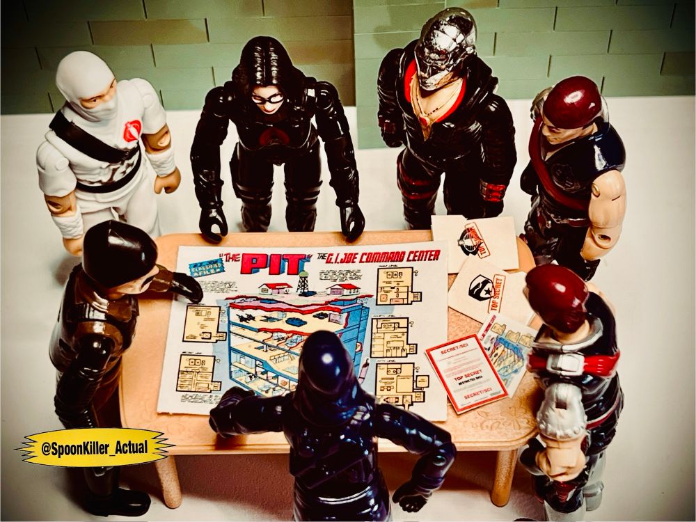 3.75” Cobra action figures planning out a mission.