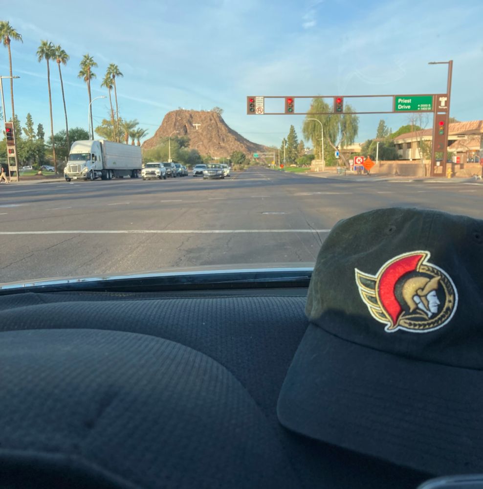 Sens hat on a car dashboard 