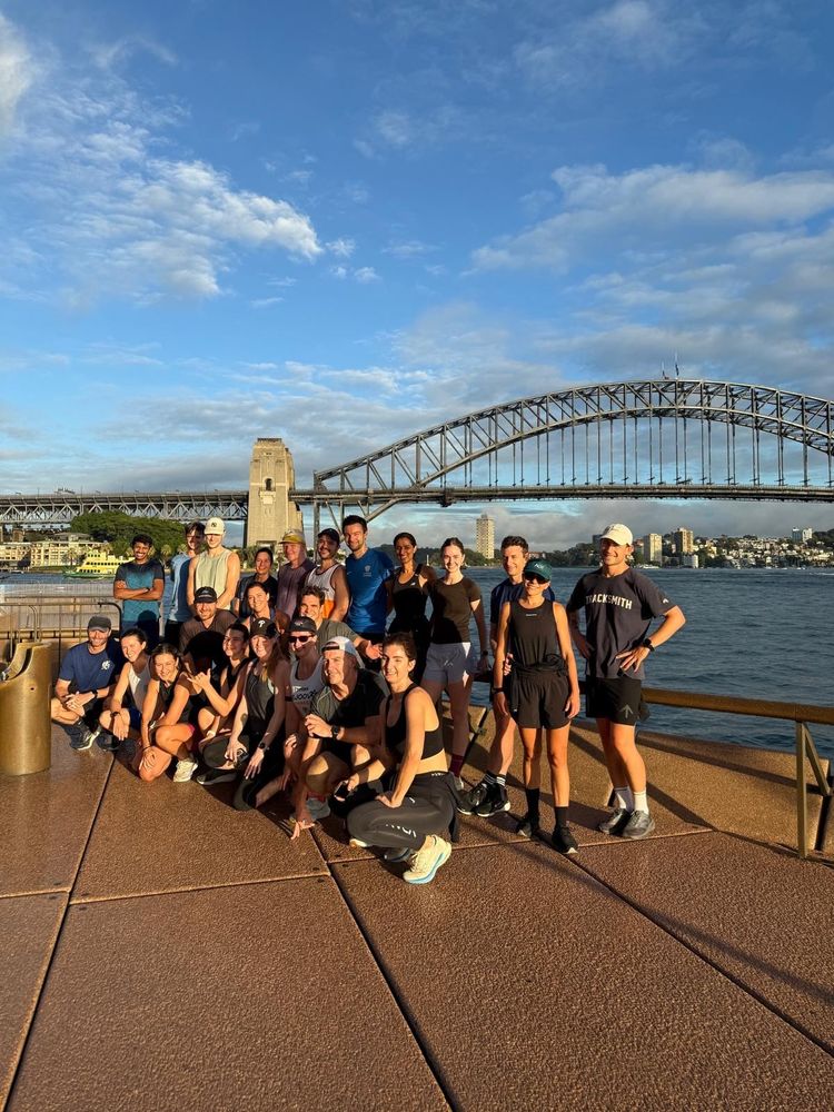 Cllimate run club in front of Sydney harbour bridge