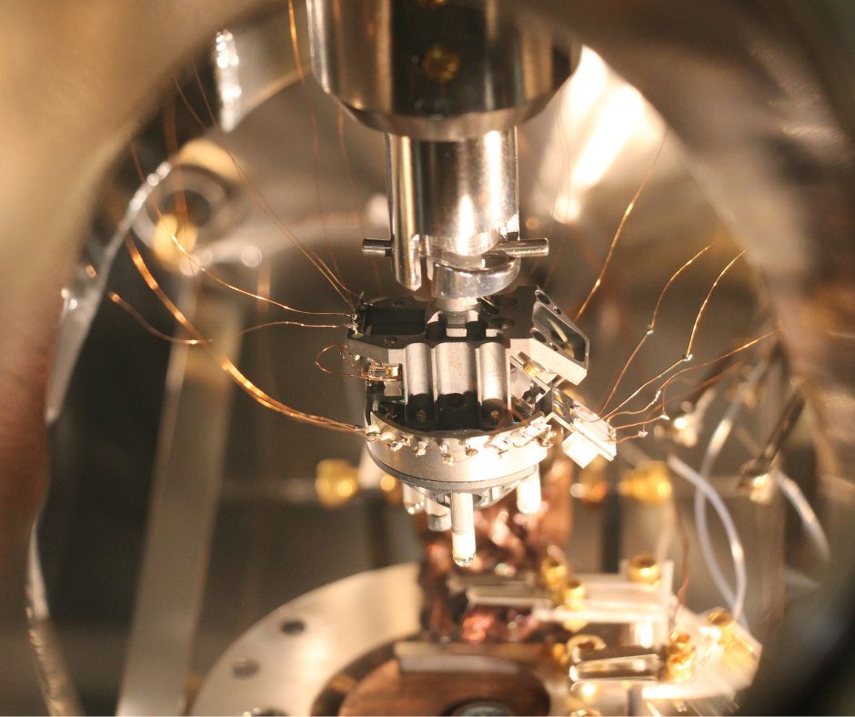 Close-up image of an atomic force microscope, where mechanochemical reactions take place in controlled gas environments under the stress applied between a nanometer-sized tip (invisible to the naked eye) and a flat surface.
