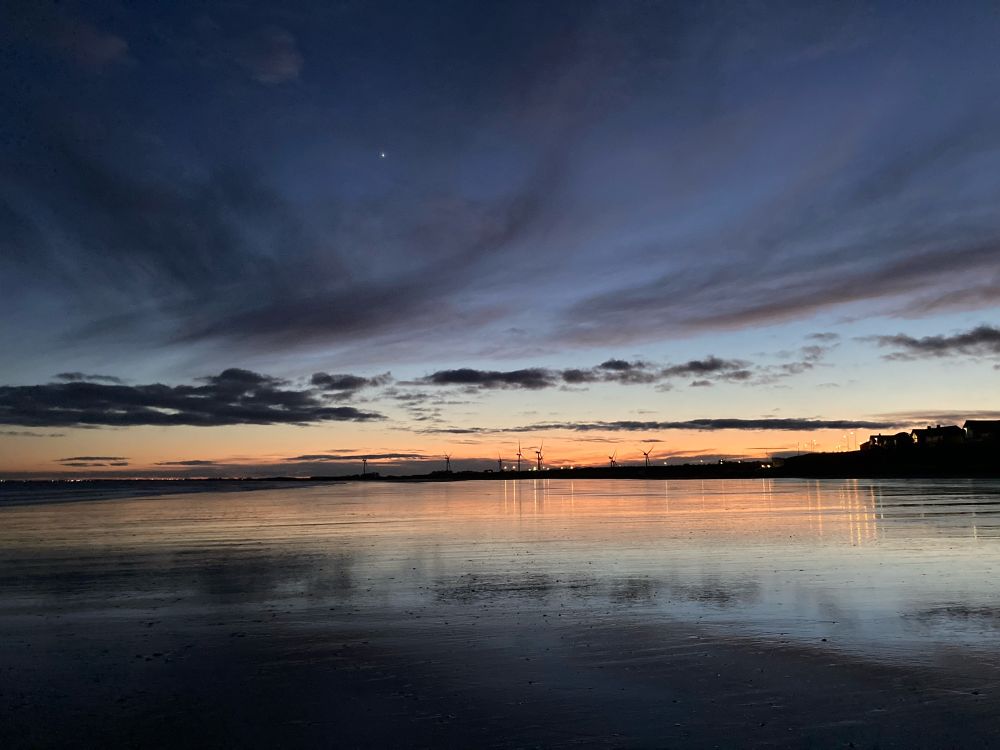 Sunset beach reflection