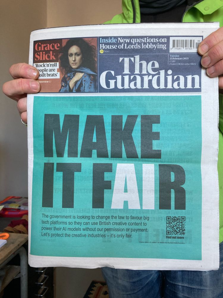 Newspaper cover with the heading make it fair with AI in white