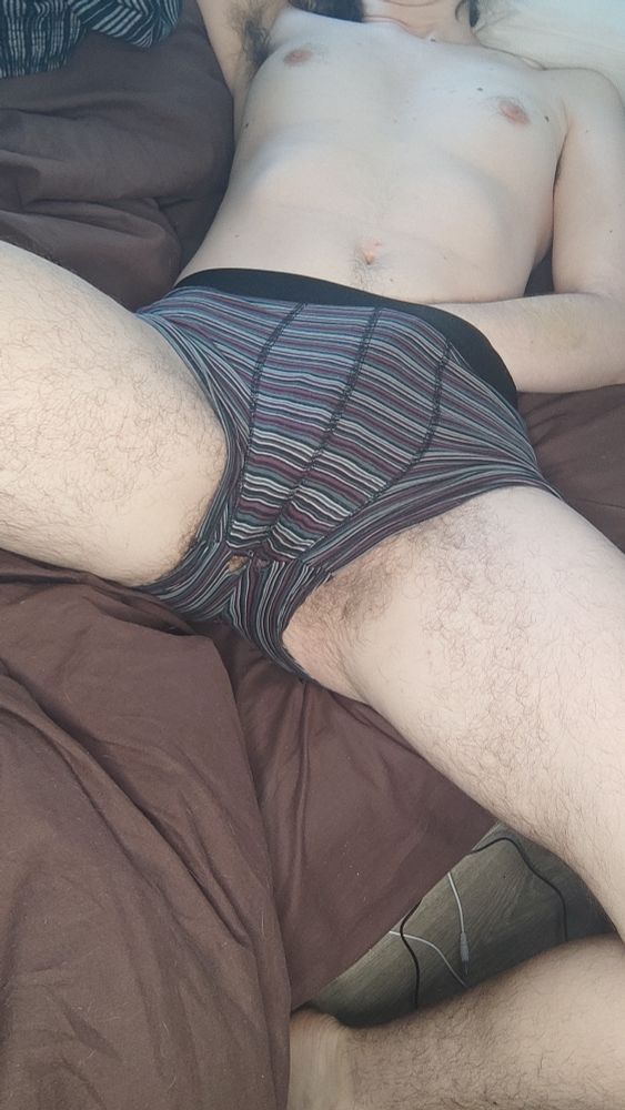 L is laying lazily on his back on his bed, only wearing distressed boxers.
His thighs are spread apart, inviting
You can see his hairy pussy through some holes in his boxers
His hand in his underwear, rubbing his pussy...
His other hand being his head, revealing his sweaty tatted armpit...
You can almost see his foot at the bottom of the bed...

He's sweaty, hairy, laying nonchalantly... Ready for you to come get a taste

Tearing his boxers off of his sweaty body...
Taking a whiff in his hairy armpit...
I wonder where you'd start 😌
