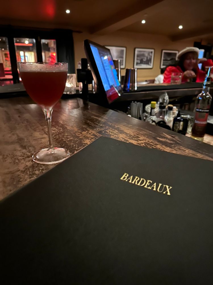 A paper plane Cocktail with decent amaro. At a place called Bordeaux. Not pictured is the excellent customer service, with suspenders.  Makes staying in the hostel worth it. 