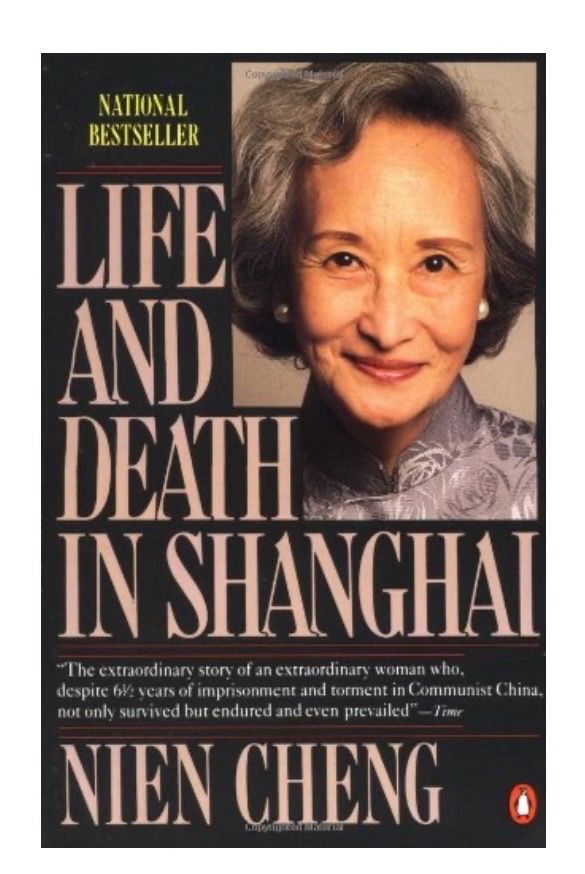 The book cover of Life and Death in Shanghai by Nien Cheng, with a photo of the author, a Chinese woman. 