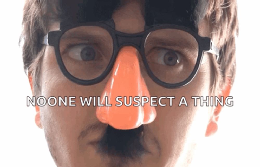 a man wearing glasses and a fake nose has the words noone will suspect a thing above his face