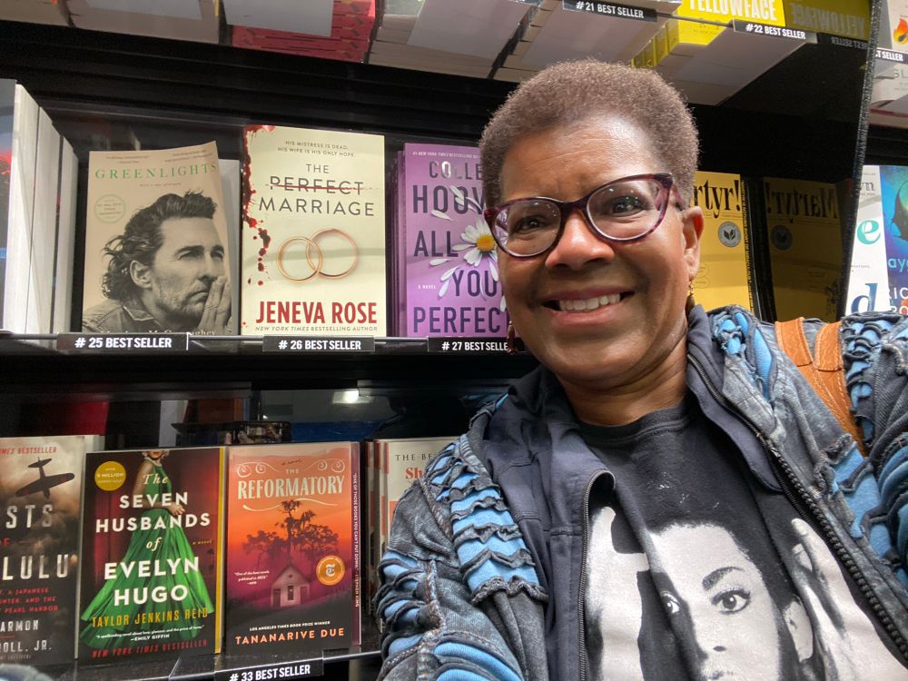 Posing in front of The Reformatory on a bookshelf 