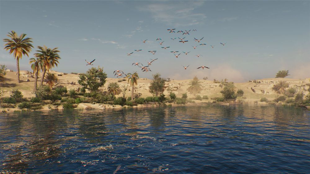 Imagen de un gran oasis en medio del desierto, con bellas aguas color azul marino sobre las que un numeroso grupo de flamencos emprenden el vuelo. Al fondo se observan dunas de arena y palmeras. El cielo es azul pálido y está prácticamente despejado.