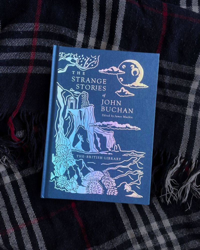 book on tartan blanket
