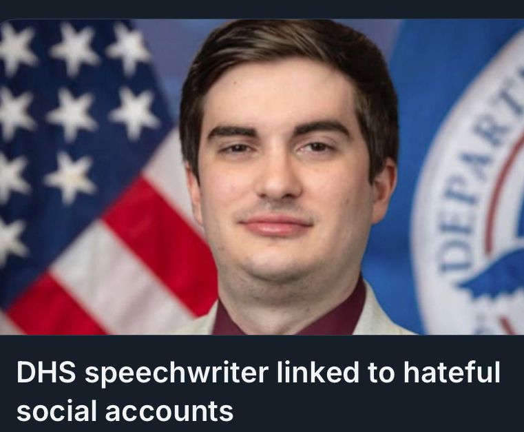 A photo from an online news article about a DHS speech writer who was posting hate-filled content online. It features a photograph of a young white man smirking.