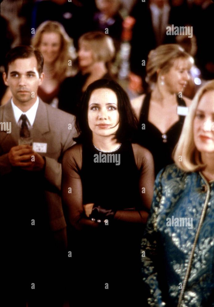 A photo of Janeane Garofalo staring at someone like they are an idiot. 
