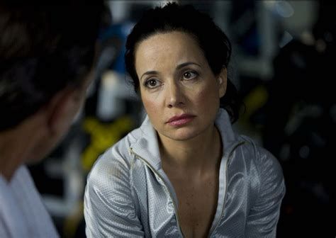 A photo of Janeane Garofalo staring at someone like they are an idiot. 