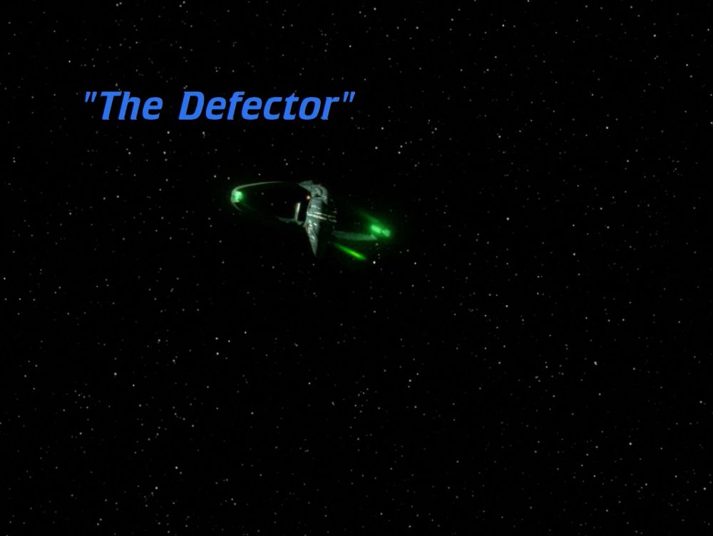 A Romulan warship is coming in fast, firing its green pew pews. In blue text we see the episode title: "The Defector."