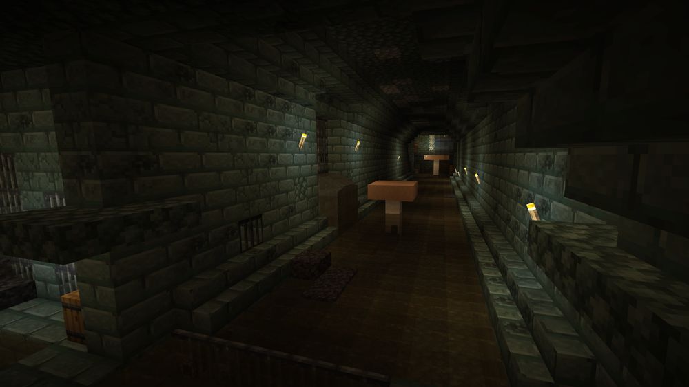 A large, dimly lit sewer far below the villages above.