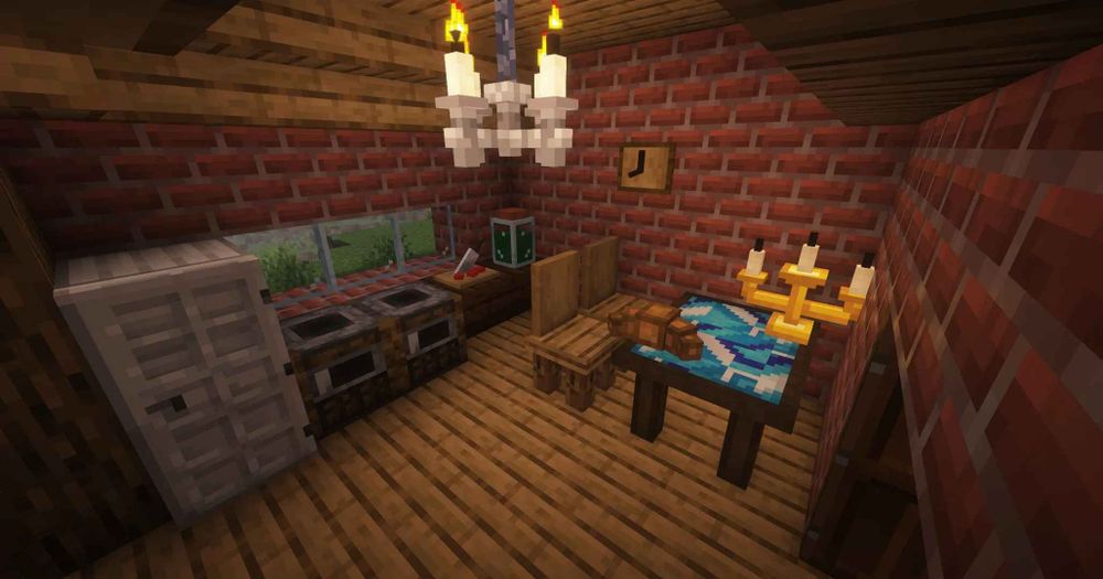 View from inside a kitchen in Minecraft, showing off some new furniture items from the mod “Immersive Furniture”. There is a white chandelier on the ceiling and a wooden clock on the wall. There is also kitchen table with candelabra and a croissant. The kitchen counter also has a jar, presumably of pickles, and a cutting board with a knife and some food item.