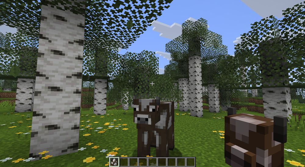 Cow in a birch forest. Player has a 3D cow egg in their hand.