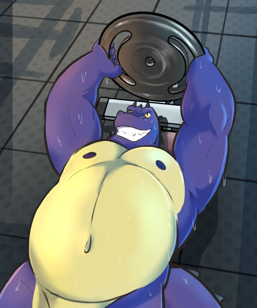 Tanks The Gator lifting a barbell weight plate to work on his triceps
