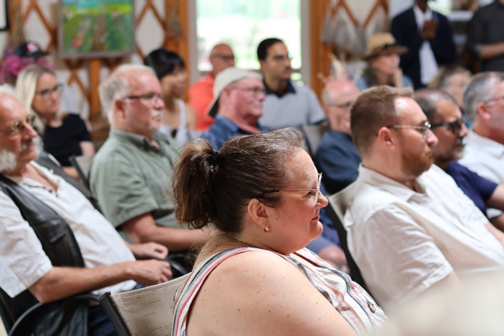 Photo of MLA Hoffman sitting in the crowd.