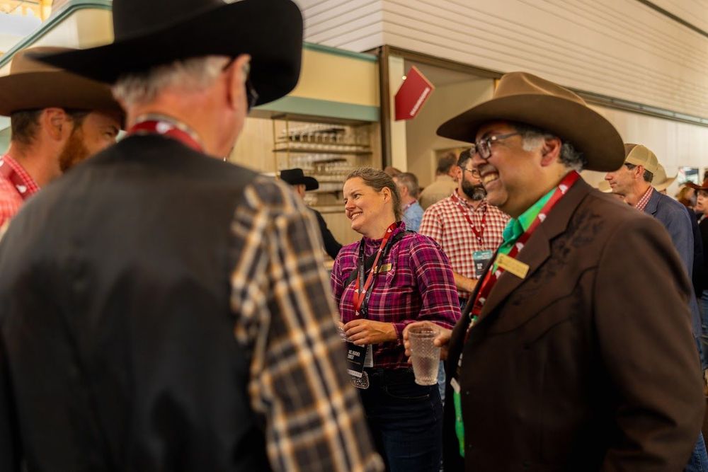 Image of MLA Sweet with Leader Nenshi talking with people