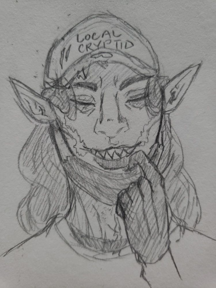 A doodle of Kir with a ball cap that says 'local cryptid' on it pulling down a face mask to reveal his toothy smile (hat by @coeykuhn.bsky.com)