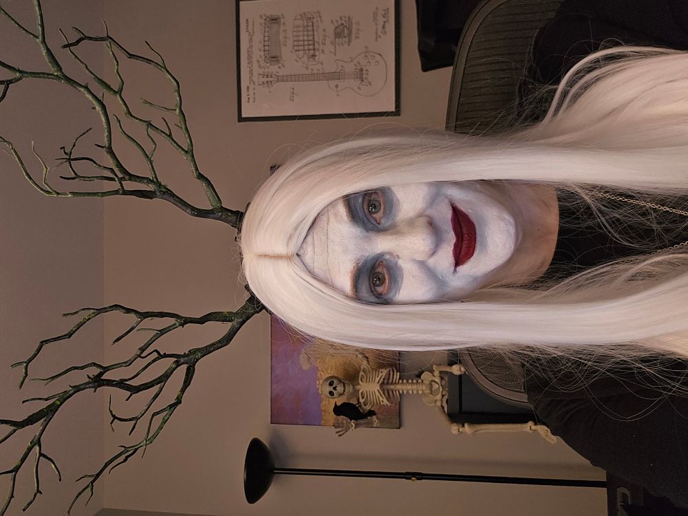 Ace King in a while wig, anglers, and Nordic witch makeup