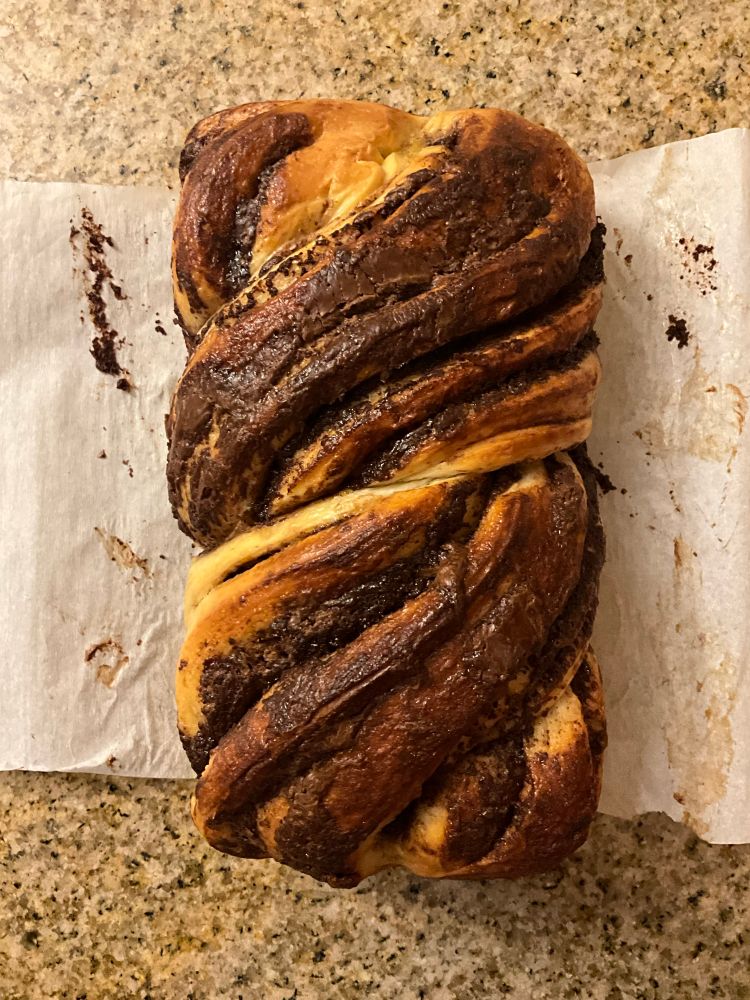 Top-down view of the lacing of a hazelnut babka