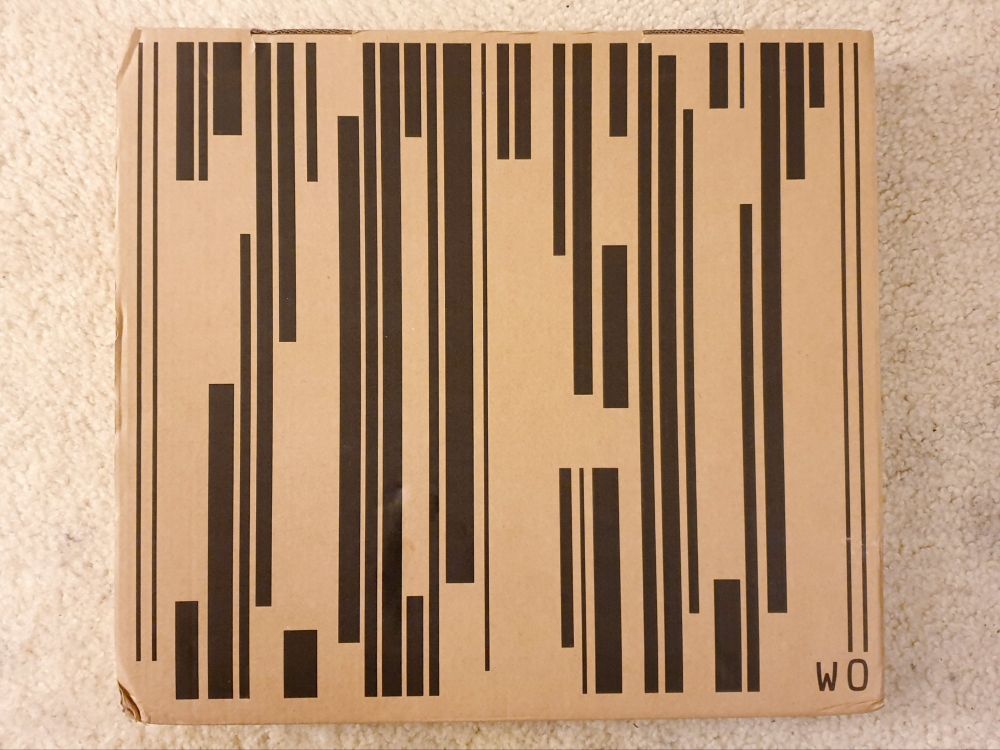 Front of the outer box WipeOut Futurism shipped in. A stylized barcode reads "2097". In the lower-right corner, the letters "WO".