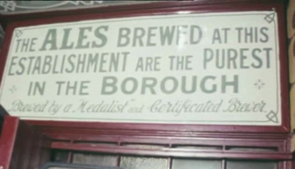 A sign saying "The ales brewed at this establishment are the purest in the borough. Brewed by a medalist and certified brewer"