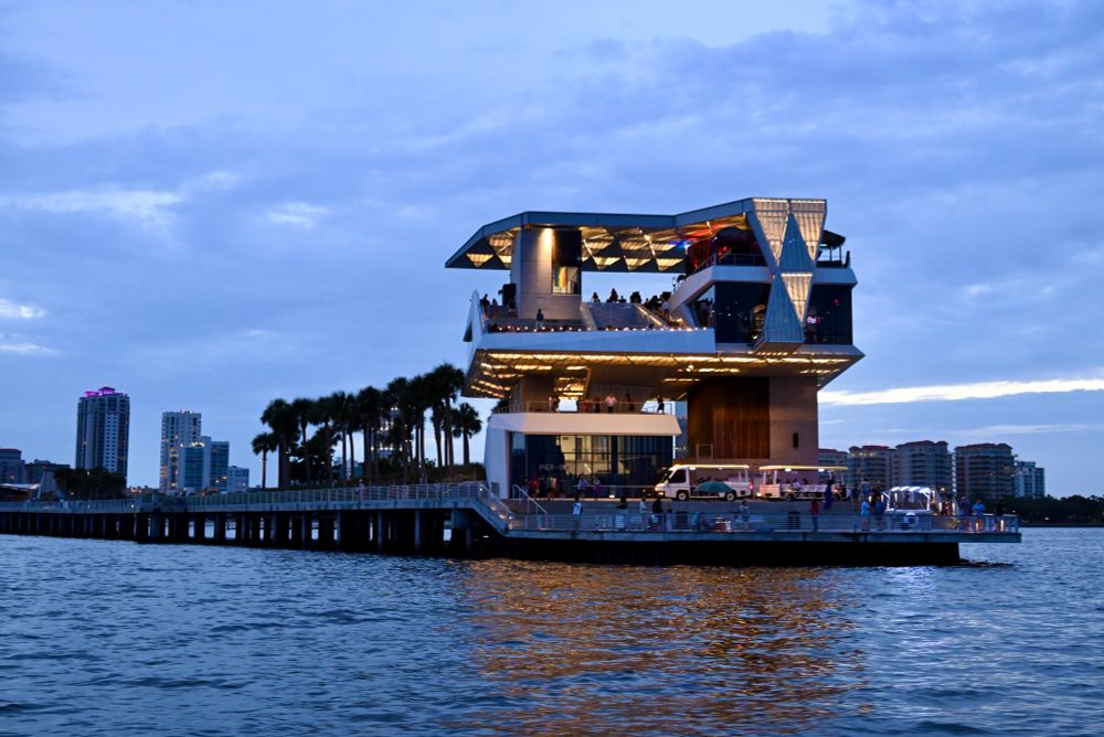 The St. Pete Pier from the Bay at dusk with a cloudy sky
