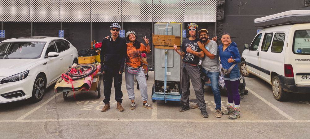 People riding cargo bikes with furniture loaded on