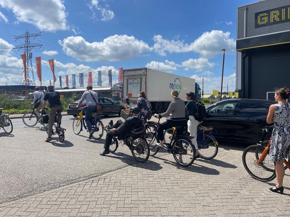 Group riding bikes in industrial estate