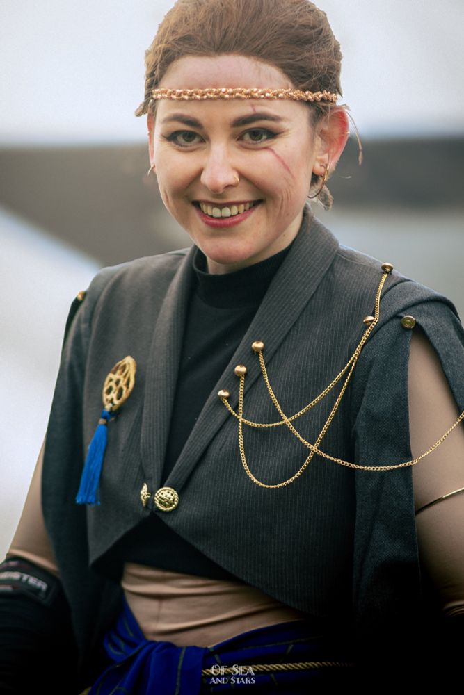 portrait of myself dressed as Beau from Critical Role, wearing her level 17 outfit from the Mighty Nein reunion 