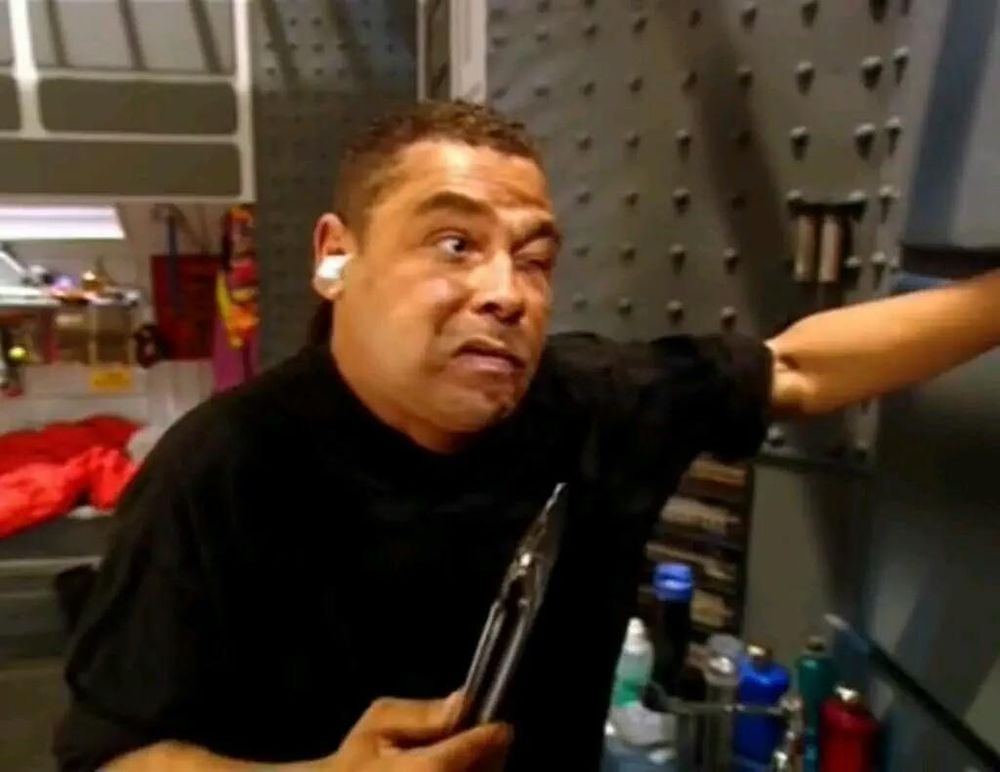 Red Dwarf - Dave Lister,  face distorted by pain and shock from nose hair rip out