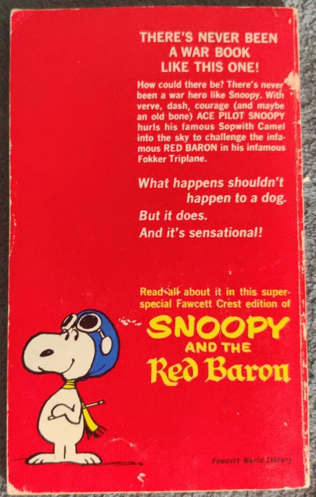 Back cover of the paperback edition of SNOOPY AND THE RED BARON, essentially a beginning-reader's book with a different color of paper on every page, with black-line comics drawings of Snoopy and his doghouse that he fantasizes is a World War 1 UK fighter plane, a Sopwith Camel.