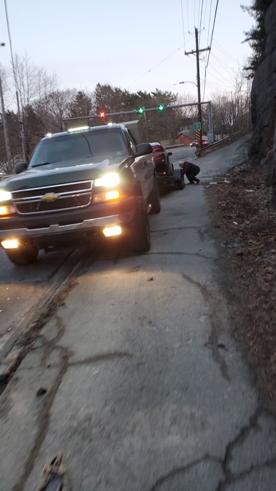 A truck parked in the sidewalk