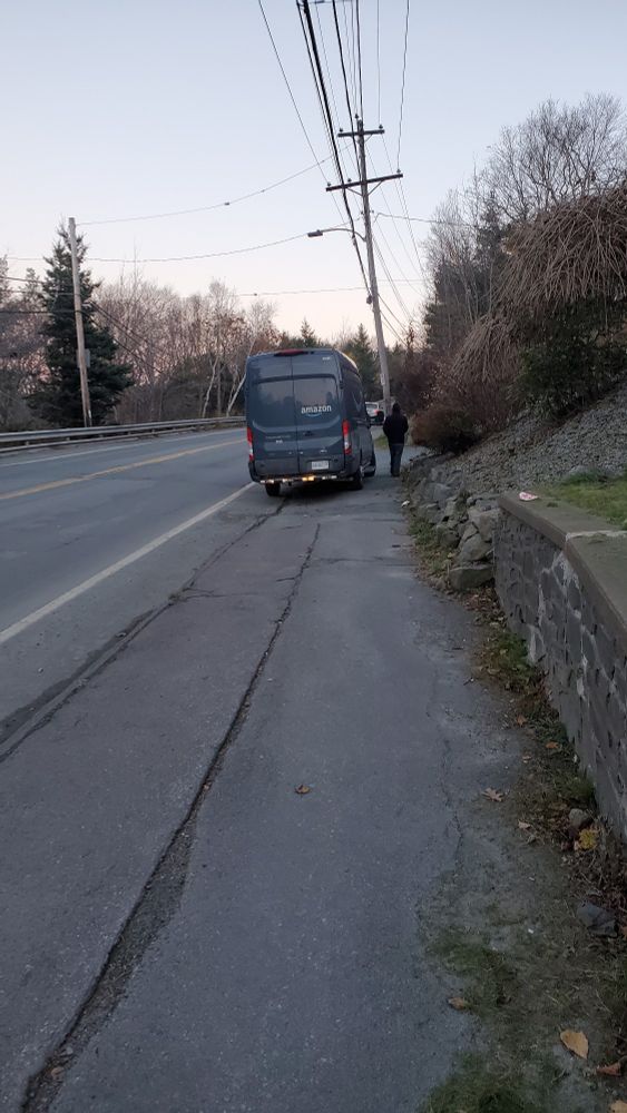 Truck parked on the sidewalk