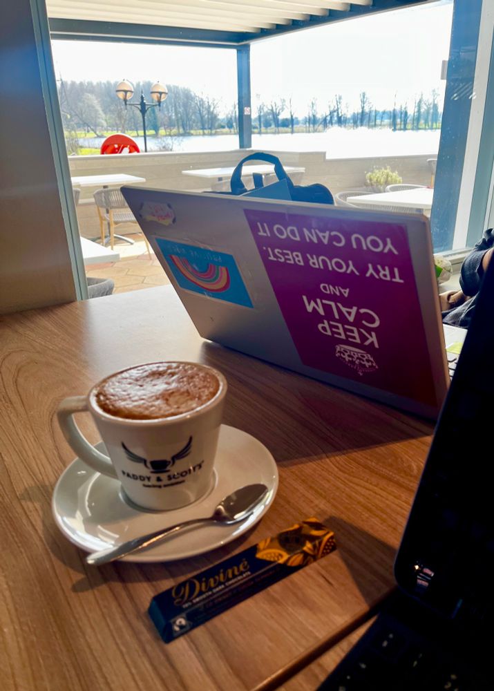 Coffee with a distinct lack of cake - some chocolate was procured though! Lake view through the window 