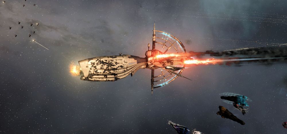A Gnosis battle cruiser from EVE Online damages, trailing flames and dark smoke, and taking more incoming fire