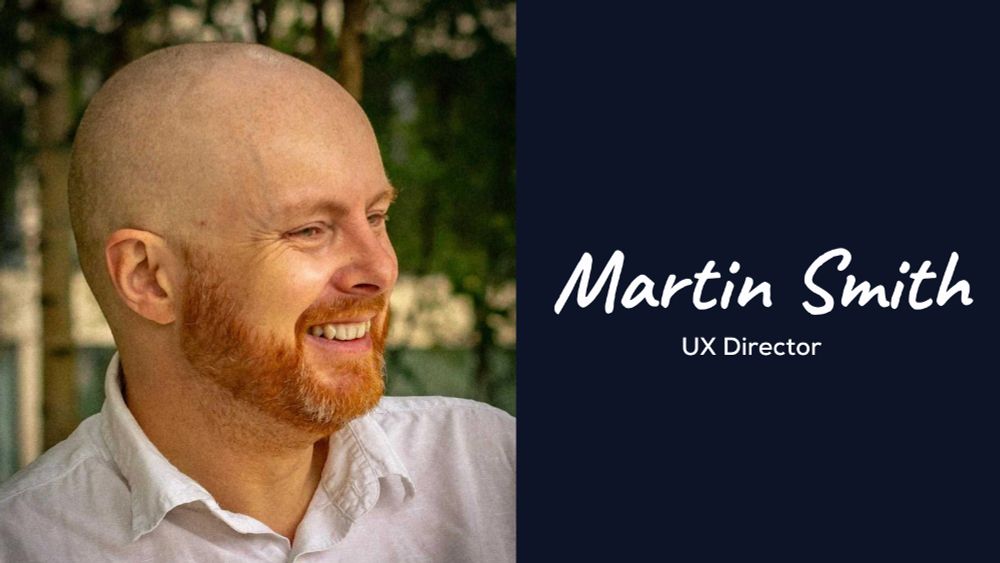A picture of Martin, wearing a white shirt, stood in front of green foliage smiling. Accompanied with writing which says, 'Martin Smith UX Director'.