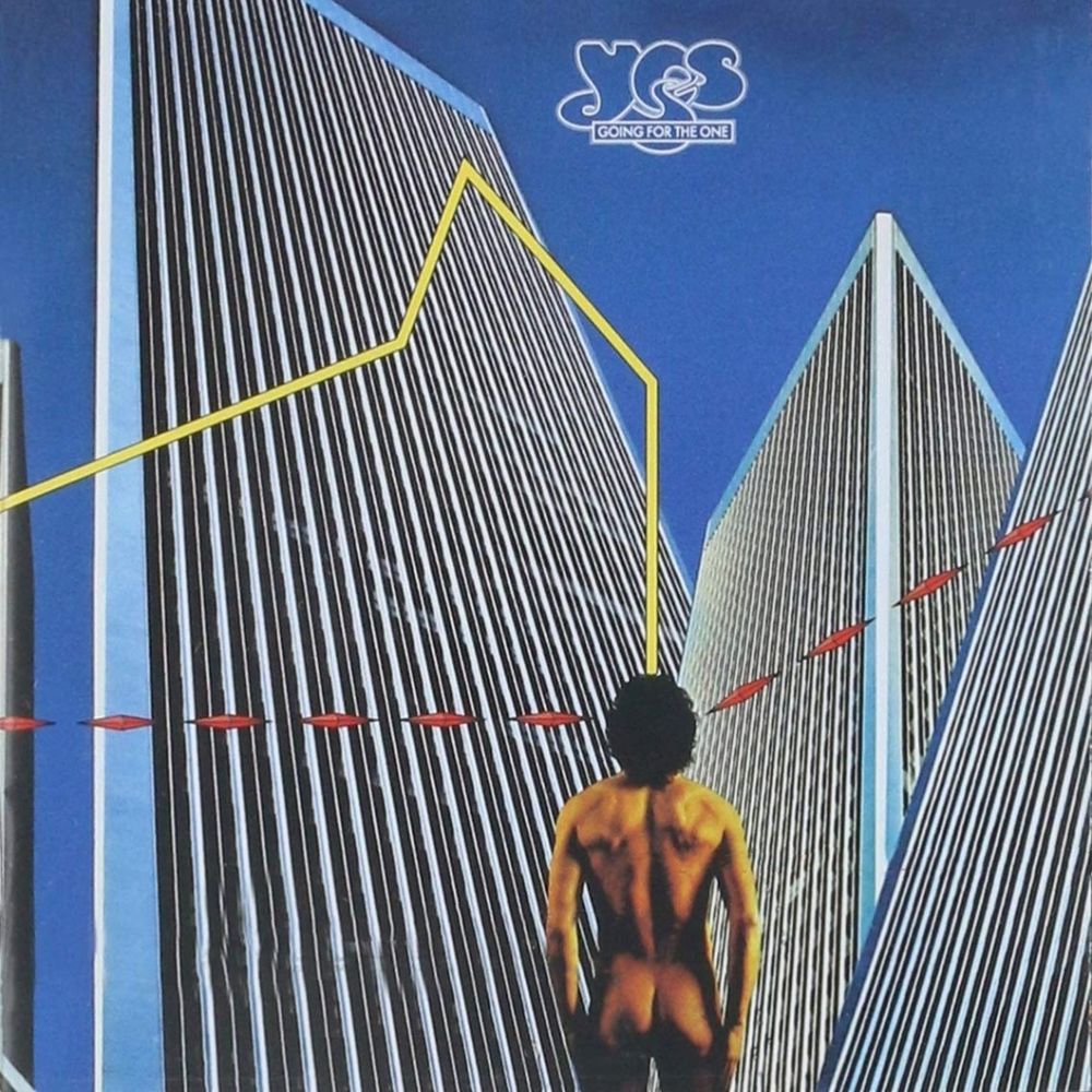 Front cover of going for the one by yes, a naked man is facing away from the viewer towards a few skyscrapers, we can see his bum 