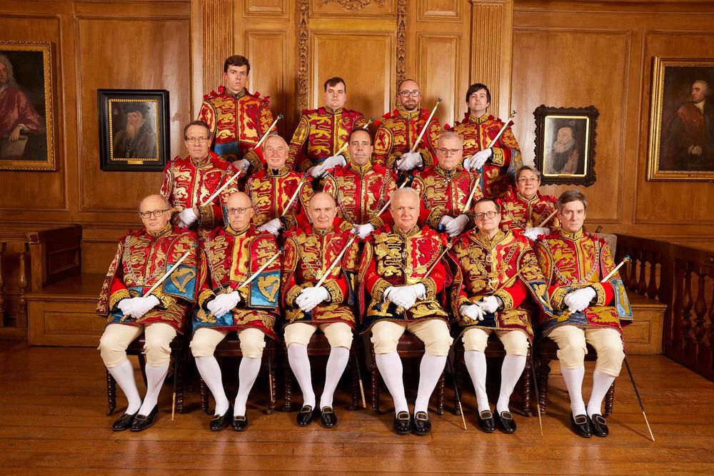 A photograph of the heralds of the College of Arms in their official uniforms as worn at the Coronation of King Charles III