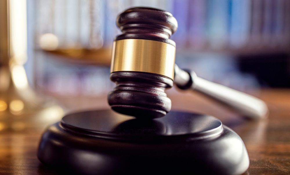 The former officer assaulted a bystander who hit his head and later died, prosecutors said.